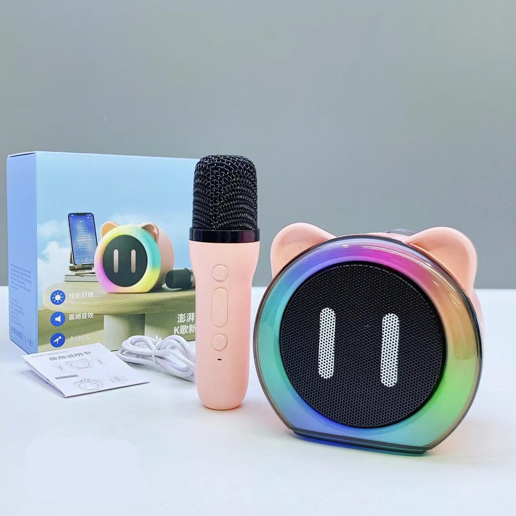 Kids Karaoke Machine and microphone shown together