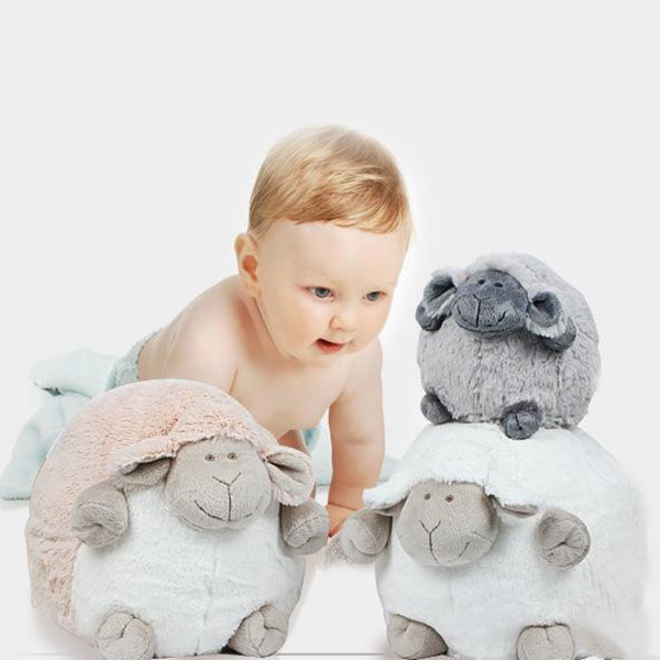 Sleepy Baby Doll held to show its 25cm size